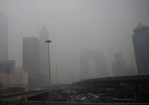 CODUL ROȘU de poluare atmosferică a fost activat în Beijing! Primele IMAGINI! | VIDEO