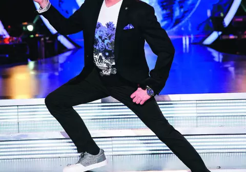 EXCLUSIV / Dezvăluiri din viața celebrului coregraf de la “Uite cine dansează”, Gigi Căciuleanu: e fan mici cu bere!
