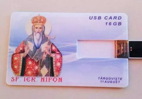 Arhiepiscopia Târgoviştei le-a făcut credincioșilor un cadou inedit: stick-uri de 16 GB cu chipul unui sfânt | FOTO