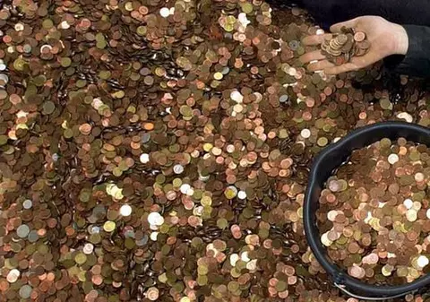 Un bancher german a fost nevoit să numere 2,5 tone de monede