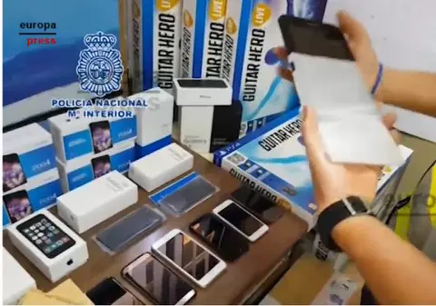 Români arestați în Spania după ce au furat peste 150.000 de euro de la mai multe companii de telefonie