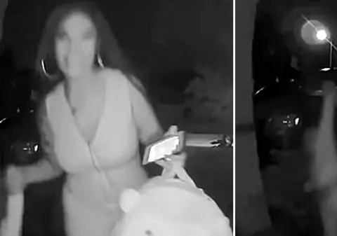 O femeie, filmată când a abandonat un copil mic, în mijlocul nopții, în fața ușii unui necunoscut și apoi a rupt-o la fugă |VIDEO