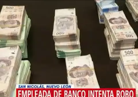 O angajată la bancă a fost prinsă când încerca să plece cu banii furați în geantă