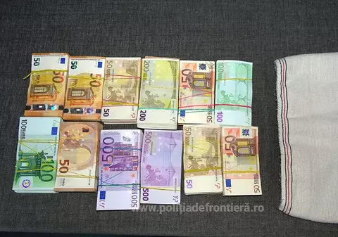 Româncă prinsă cu aproape un sfert de milion de euro ascuns sub haină când voia să iasă din țară