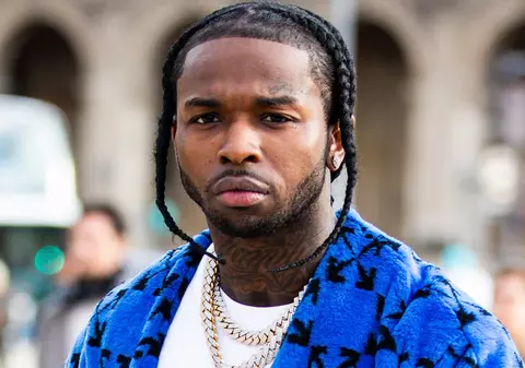 Un rapper american a fost împușcat mortal în propria casă, în urma unui jaf armat