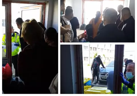 Imagini de la Galați: oamenii care ies din carantină se îngrămădesc la ieșire și sunt „verificați” de DSP pe capota unei mașini