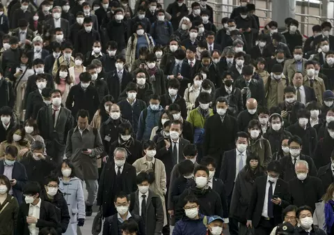 Japonia va oferi un ajutor financiar fiecărui rezident, japonez sau străin. Câţi bani vor primi oamenii