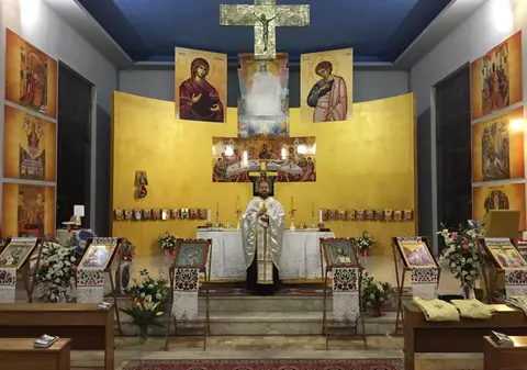 Români amendați, după ce s-au închis într-o biserică din Italia să sărbătorească Paștele