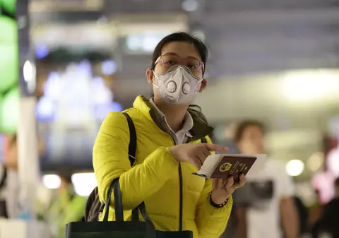 China lansează un pașaport de sănătate pentru călătoriile în străinătate