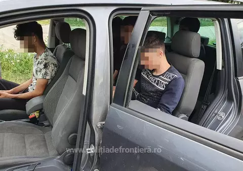 Doi români au fost prinși în fragrant în timp ce introduceau ilegal 8 migranți în țară