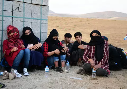 Zece afgani au fost găsiți de polițiștii germani ascunși într-un camion condus de un român