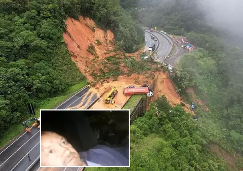 Un șofer de TIR s-a filmat îngrozit în cabina camionului îngropat sub tone de piatră și noroi, pe o autostradă din Brazilia