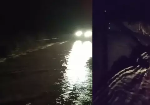 Circulație oprită pe un drum din Harghita, după ce un pârâu a inundat carosabilul. Pe alte drumuri din zonă a fost semnalat polei | VIDEO