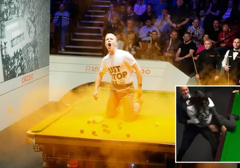 Protest la Campionatul Mondial de snooker. O femeie a vrut să se lipească de masa de joc, un alt protestatar a acoperit masa cu pulbere portocalie
