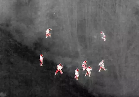 „Imagini care nu au mai fost văzute până acum în Elveția”, publicate de poliție: un român e urmărit cu drona cu termoviziune și apoi prins de un câine polițist