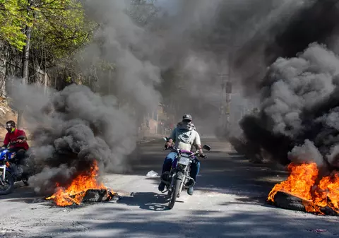 Stare de urgență în Haiti după ce mii de deținuți au evadat. Liderul unei bande criminale spune că vrea să-l răstoarne pe premier