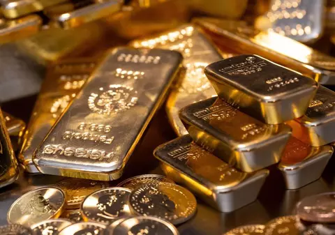 Gramul de aur a bătut un nou record și a ajuns la 415,32 lei. Ce s-a întâmplat cu euro și dolarul