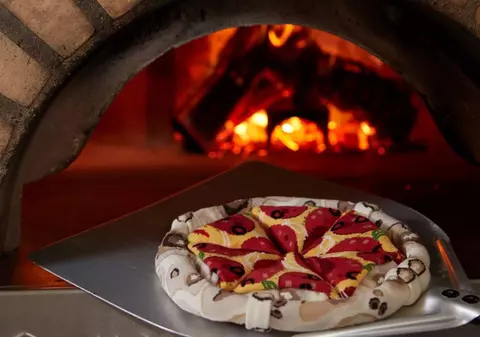 Un restaurant din Marea Britanie cere 100 de lire fiecărui client care vrea ananas pe pizza