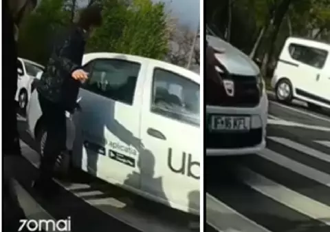 Momentul în care un șofer de Uber trece pe roșu și este aproape să spulbere pietonii care voiau să traverseze