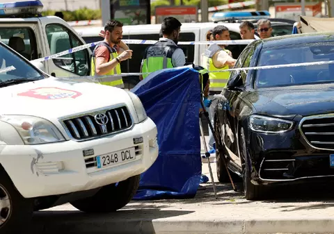 Fost oficial ucrainean împușcat mortal în fața unei școli americane din Madrid. Bărbatul își lăsase copiii la cursuri