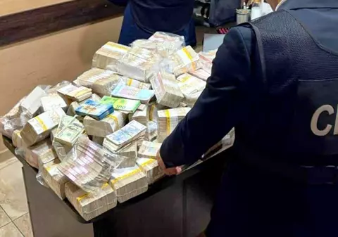 Percheziții și peste un milion de euro confiscat într-un dosar privind fraudarea alegerilor din Rep. Moldova