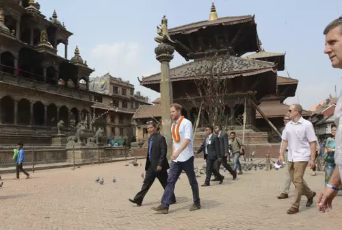 epa05222092 Britain's Prince Harry visits heritage sites in Patan Durbar Square in the outskirts of Kathmandu, Nepal, 20 March 2016. Harry arrived in Nepal for a five-day visit and said he hopes to shine a spotlight on resilience of Nepali people recovering from last year's devastating quake. EPA/PRAKASH MATHEMA / POOL EPA POOL