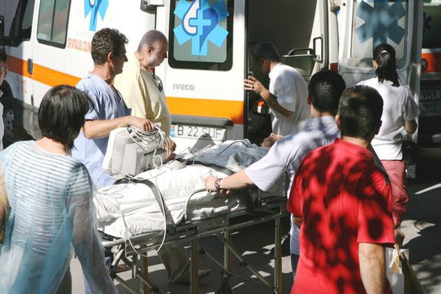 Foto| Soţia rănită a lui George Naghi a fost dusă în străinătate