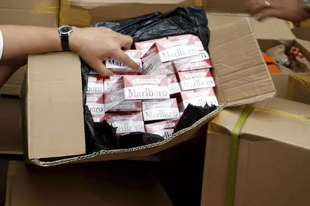 390.000 de pachete de ţigări ascunse printre blaturi de pizza