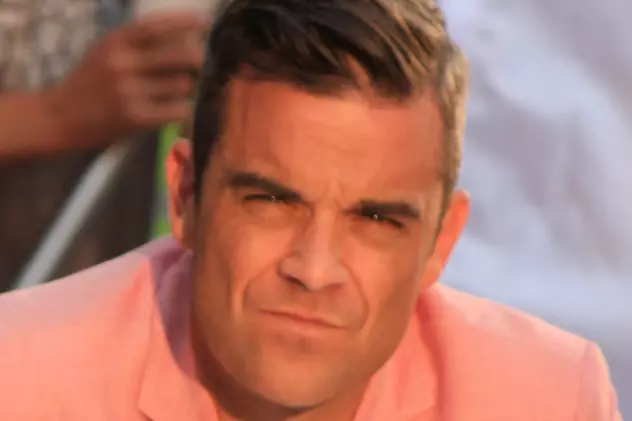TRUPA CARE L-A CONSACRAT L-A ADUS APROAPE DE FALIMENT! Robbie Williams A PLĂTIT O AVERE ca să iasă din formaţia Take That şi A RĂMAS CU DATORII!