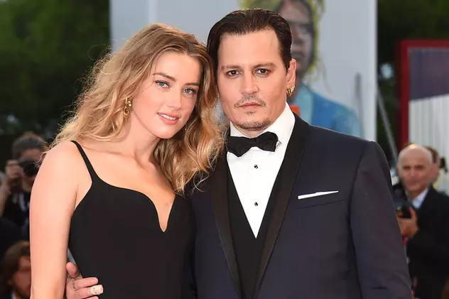 Este oficial! Johnny Depp și Amber Heard divorțează