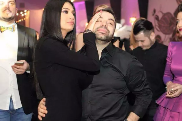 Roxana Dobre îl mângîie pe frunte pe Florin Salam, la o petrecere