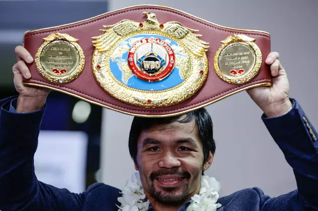 Boxerul filipinez Manny Pacquiao, cu centura de campion WBO. (FOTO: EPA)