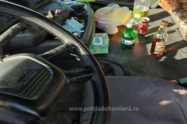 Șofer român de TIR prins când se cinstea singur de ziua lui, în cabină, în mers. Bea coniac cu energizant și bere, la volan