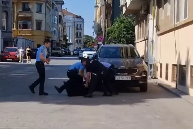 VIDEO | Călugăr din Constanța, scandal cu Poliția pe stradă. A fost pus la pământ și încătușat. Ce spune Arhiepiscopia