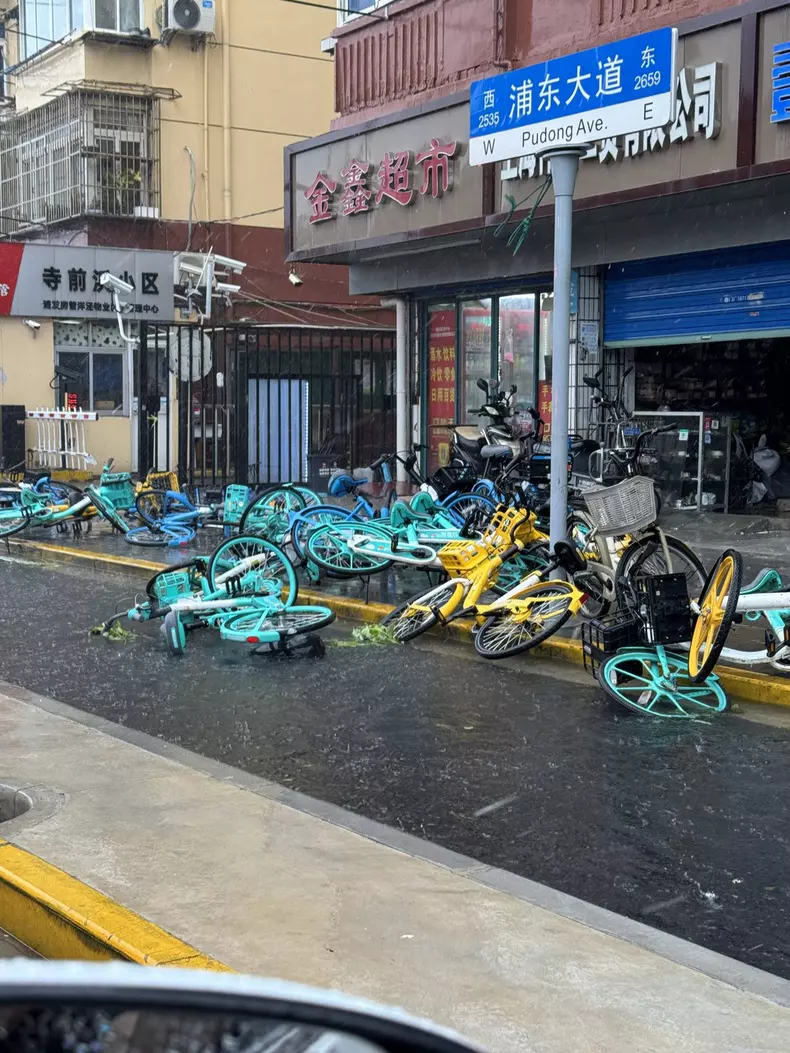 Typhoon Bebika Makes Landfall in Shangha SHANGHAI, CHINA - SEPTEMBER 16, 2024 - Shared bicycles are blown down during he