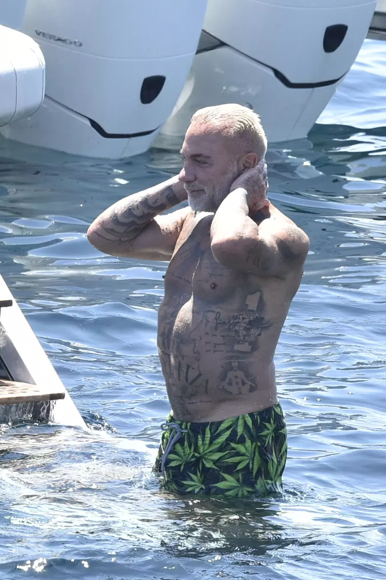 Gianluca Vacchi on a boat in Sardinia with his pregnant girlfriend Sharon Fonseca