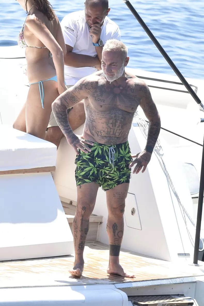 Gianluca Vacchi on a boat in Sardinia with his pregnant girlfriend Sharon Fonseca