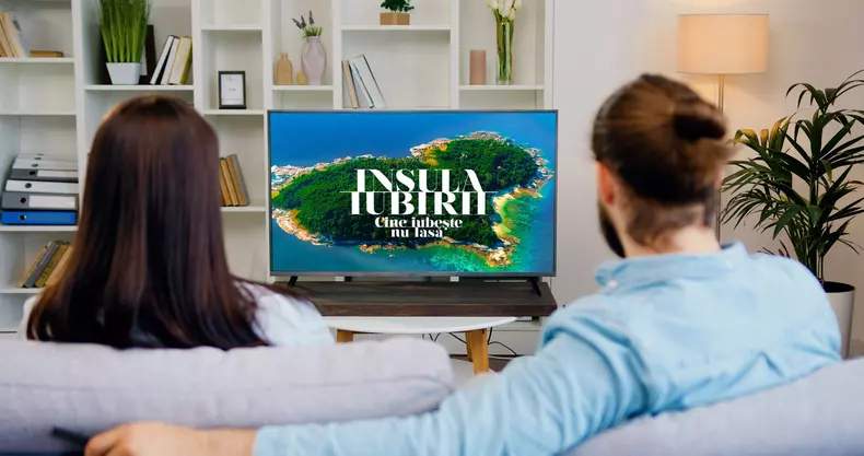Happy,Couple,Watching,Tv,And,Switching,Channels,Looking,At,Green