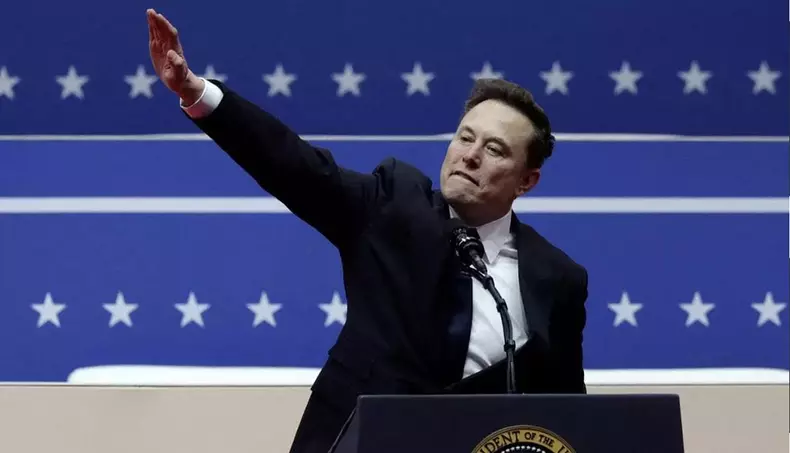 U.S.: Washington - Nazi Fascist salute? SpaceX CEO Elon Musk gestures during a rally on the inauguration day of U.S. President Donald Trumps second Presidential term, inside Capital One, in Washington, U.S. January 20, 2025..