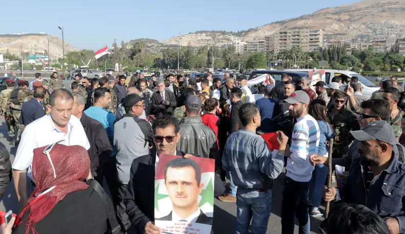 Protest in Damascus after US and allies launched strikes on Syria
