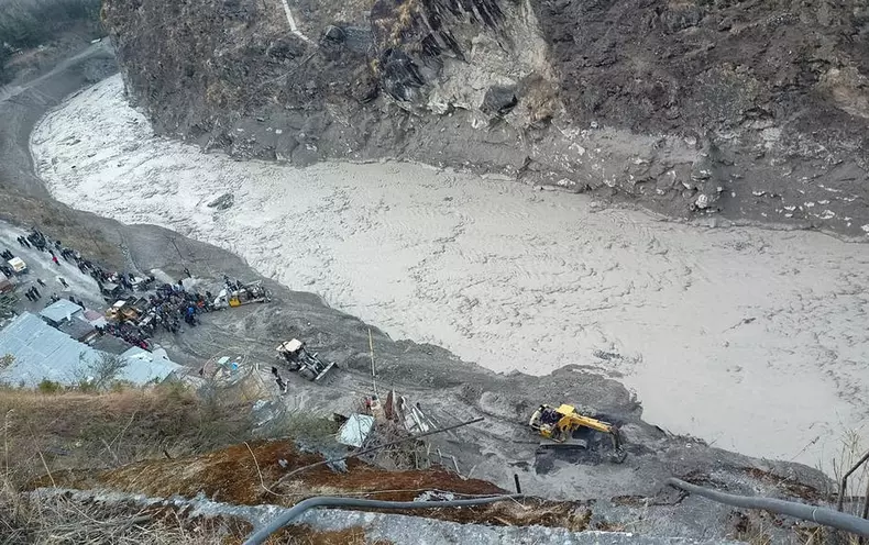 Himalayan glacier breaks off causing heavy flooding in northern India with scores feared dead
