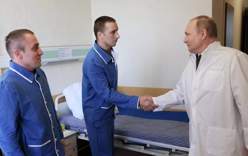 Russian President Putin visits a military hospital