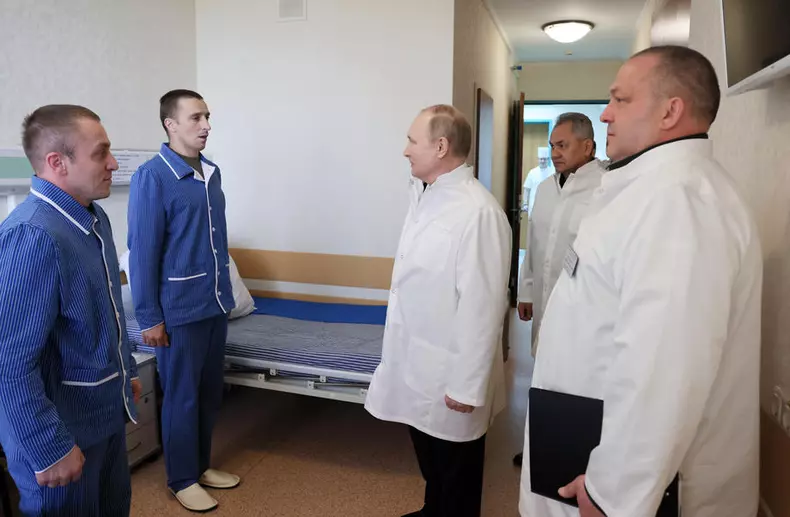 Russian President Putin visits a military hospital
