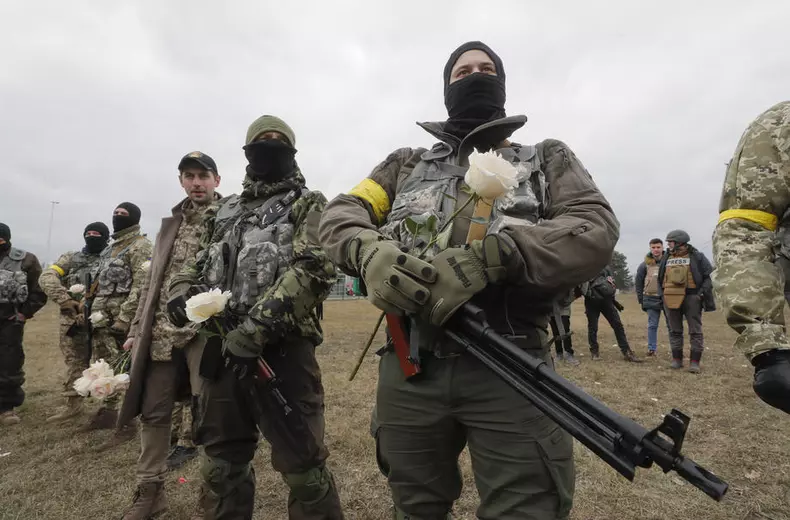 Ukrainian territorial defense fighters tie the knot amid Russian military operation