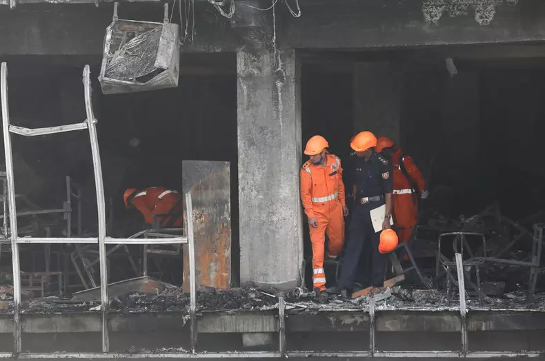 At least 27 killed in commercial building fire outside Delhi