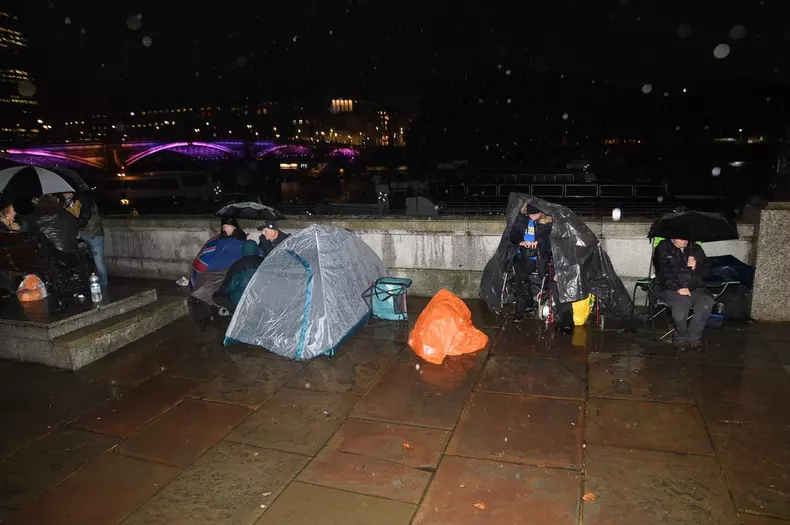 People In The Queue To See The Queen In Westminster Abbey During Heavy Rain, London - 13 Sep 2022