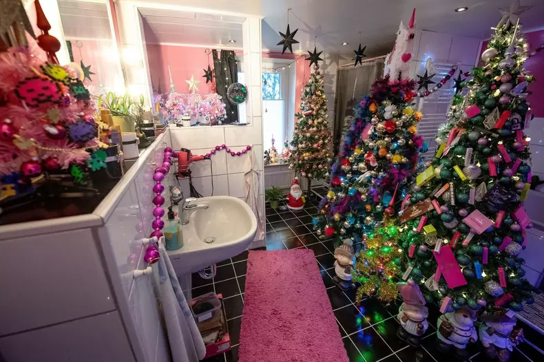 Rinteln, Germany. 04th Dec, 2019. There are dozens of Christmas trees in the Jeromin family bathroom. There are many Christmas houses in Germany that are illuminated from the outside. Thomas Jeromin, on the other hand, has created a Christmas wonderland i