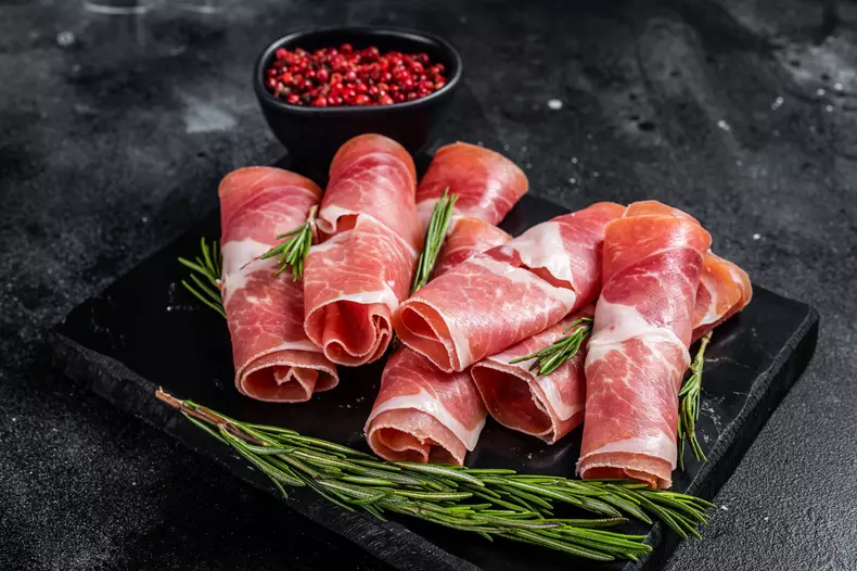 Traditional,Spanish,Jamon,Serrano,Ham,On,Marble,Board.,Black,Background.