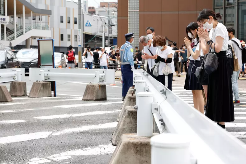 People in Nara bring flowers a day after the murder of former PM Shinzo Abe