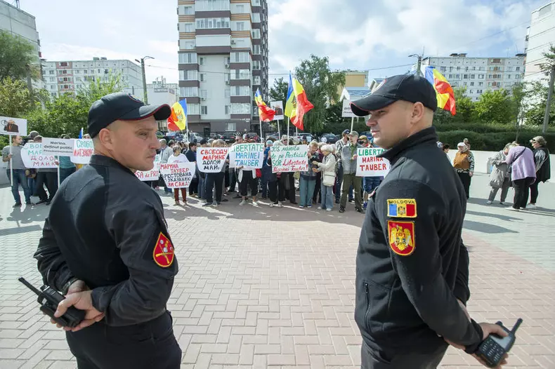 Supporters of the Shor and Communist political parties attend a protest